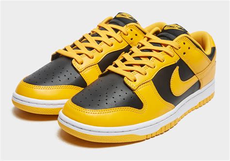 nike dunks gold and black